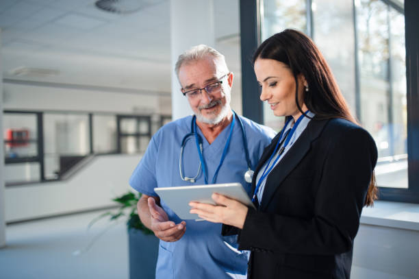doctors looking at a clipboard