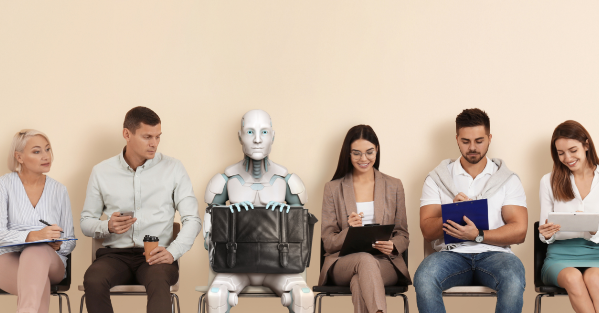 Robot sitting among a group of business leaders.